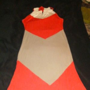 Long diamond colored form fitting sleeveless dress